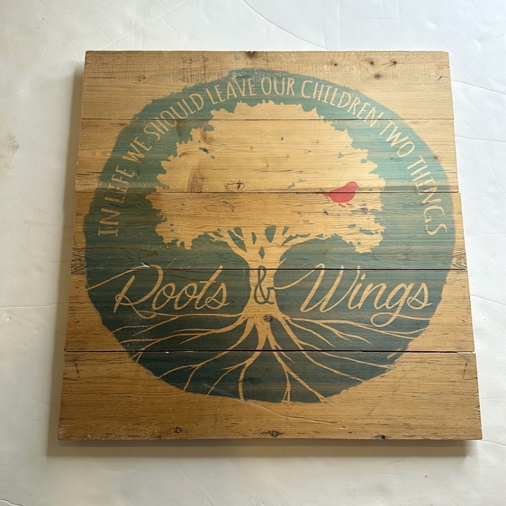 wooden sign In life there are 2 things we should leave our children.